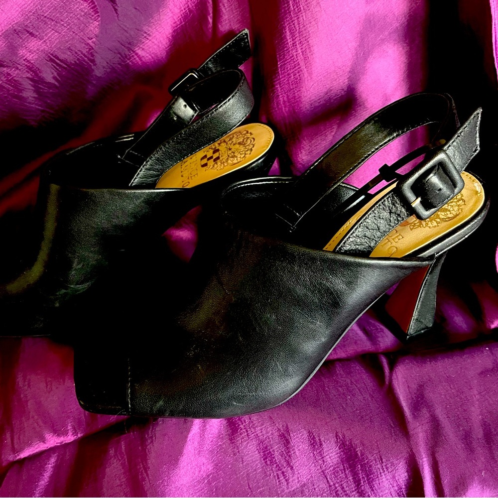 New black sling back heels.